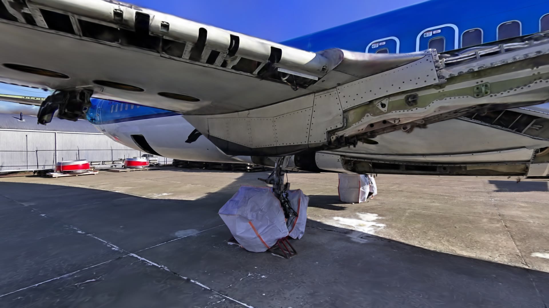 Under the wing: main landing gear and belly panels
